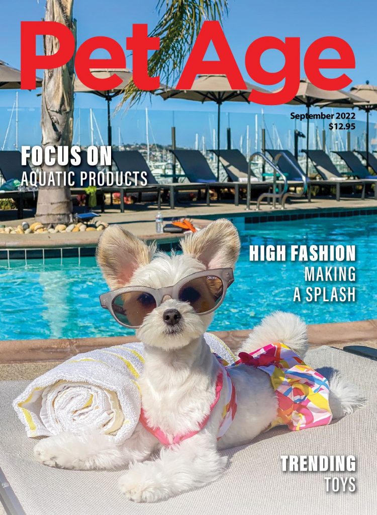 PetAge-September2022-Cover, dog in sunglasses and a swimsuit sunbathing by the pool
